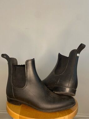 Black Chelsea boots, well-loved
